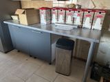 a counter with a bunch of boxes on top of it