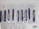 six toothbrushes in the packages on the table