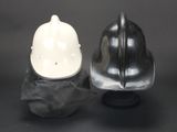 two helmets that are sitting next to each other