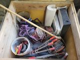 a wooden box filled with assorted tools and tools
