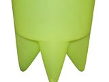 a green planter with three pointed legs and a white base
