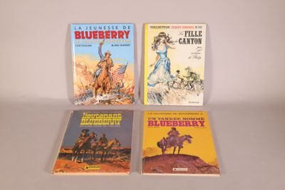 Trois livres sont posés sur une surface blanche ; l'un est une myrtille et l'autre est une myrtille.