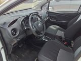 a small car with black seats and a steering wheel