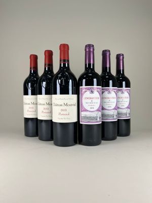 six bottles of wine are lined up on a table