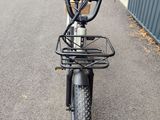 an image of a bicycle parked on the side of the road