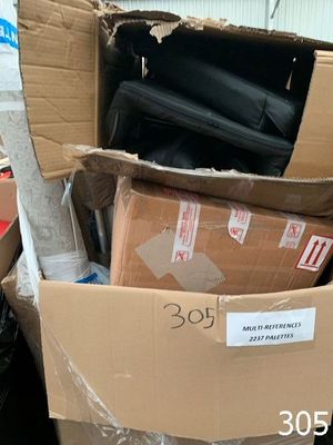 a cardboard box full of items in a room