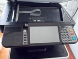 a printer that is sitting on top of a desk