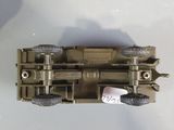 a close up of a toy army vehicle on a table