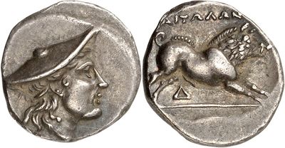 a silver coin with an image of a woman and a horse on it