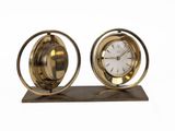 two clocks that are sitting on top of each other