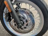 a close up of the front wheel of a motorcycle
