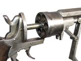 a gun that is attached to the side of a gun