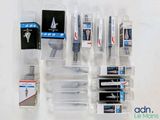 a lot of pens and pencils that are in the bag