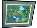 tableau encadré représentant un flamant rose dans un décor tropical