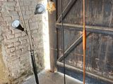 two lamps that are standing next to each other on the floor