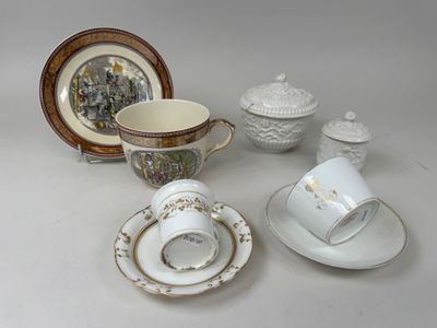many different types of tea cups and saucers on the table