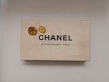 chanel logo on a box of chanel earrings