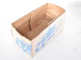 a cardboard box that is sitting on a white surface