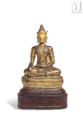 an image of a statue of a person sitting in a lotus position