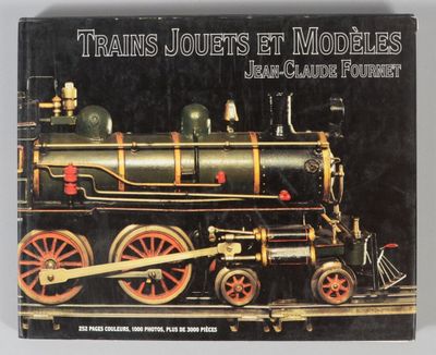 un livre sur lequel figure l'image d'un train