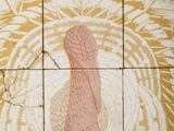 tiled floor with a turkey on it in a public bathroom