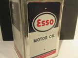 a small metal box with a red and white sign on it