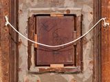 a picture of a wooden frame with a drawing on it