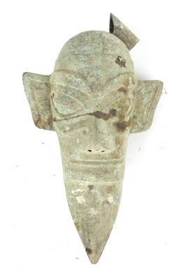 an image of a metal object on a white surface