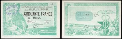 a close up of two different bills with different designs on them