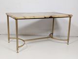 an image of a marble top coffee table with brass legs
