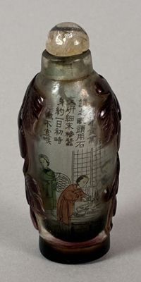 two vases with asian designs on them on a table