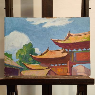 a picture of a painting on a easel in a room