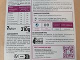 the back of a bag of food with a price label on it