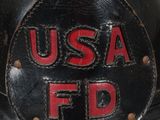 a close up of a fireman ' s hat with the word usa fd written on it
