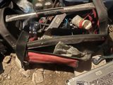 an image of a pile of junk that is sitting on the ground