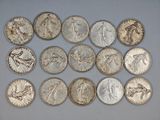 a close up of a bunch of coins sitting on top of a table