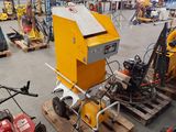 a machine that is sitting on a pallet in a warehouse