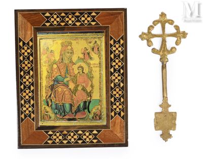 une image représentant une croix et un tableau accroché au mur