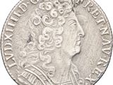 a silver coin with an image of a woman wearing a crown on it