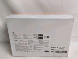 the back of a white box with a black label on it