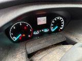 a car dashboard with a speedometer and gauges on it