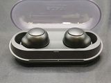 a pair of earphones that are sitting on a table