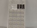 a close up of a bag of buttons on a table