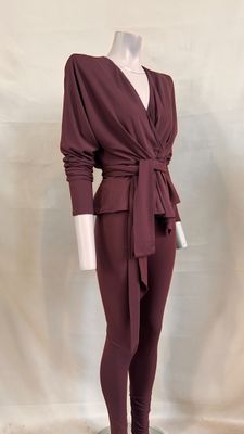 a picture of a mannequin wearing a maroon top and pants