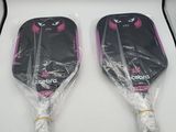 two paddles are wrapped in plastic and ready to be used