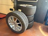 tires stacked on top of each other in a garage