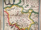 an old map of the country of england on a table