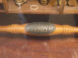 a baseball bat sitting on top of a wooden table
