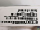 the back of a white box with a bar code on it