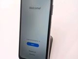 an image of a cell phone sitting on top of a table